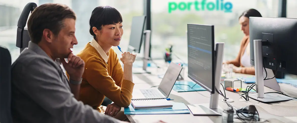 Portfolio+ employees managing coreops