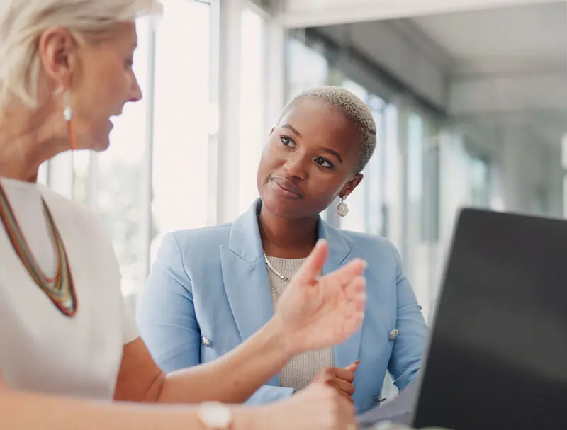 women chatting about Portfolio+ demos